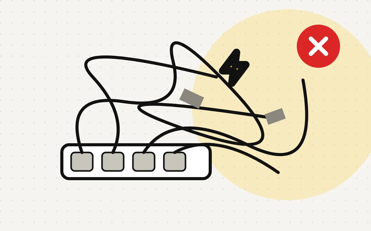 Instalação elétrica improvisada: extensão sobrecarregada, fios emaranhados e emendas com fita